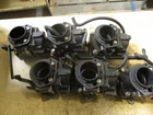 Johnson/evinrude 2-STROKE Outboard Carburetor Set W/throttle Body 436882 Used. Price: $170.00.