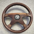 Doral Branded Grant Mahogany Wooden Steering Wheel. Price: $100.00.